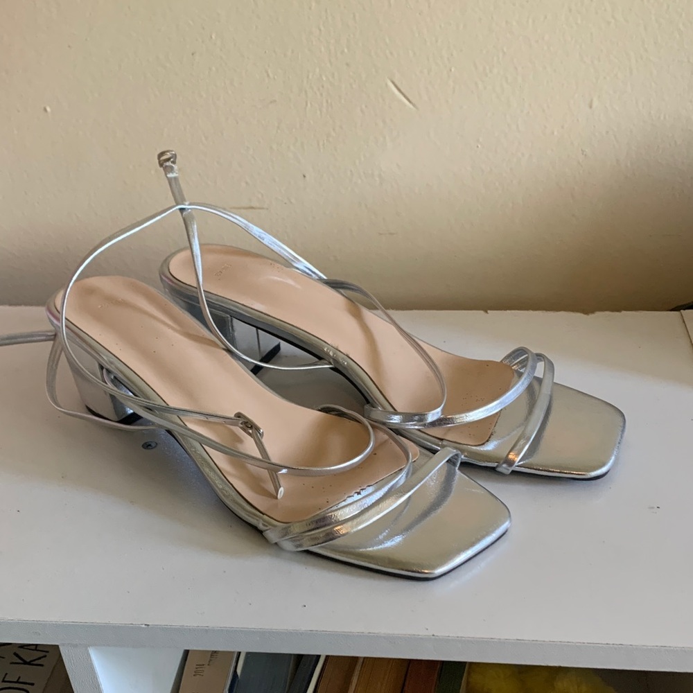 Silver open toed low heel shoes sandals